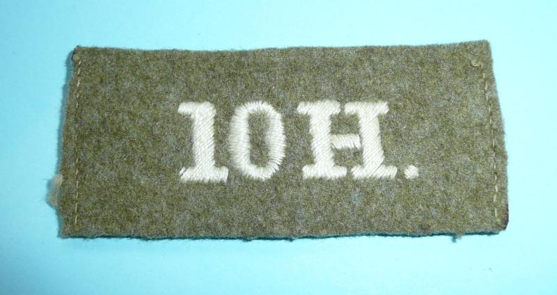 WW1 - '10H' - 10th Royal Hussars (PoW's) Woven White on Khaki Cloth Slip On Shoulder Title